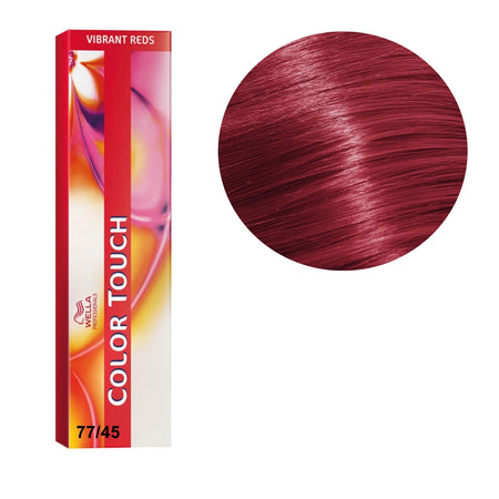 a tube of red hair color next to a box